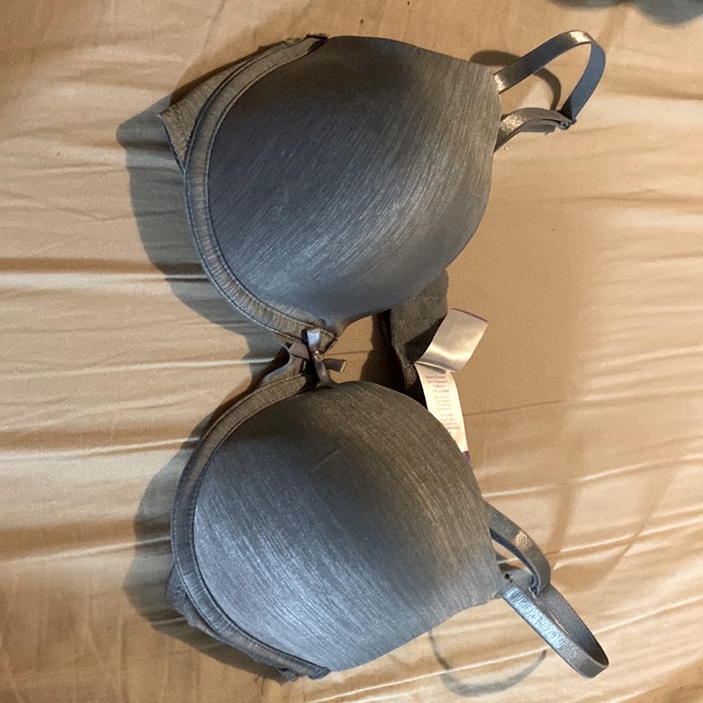 Grey with bow in front under wire
